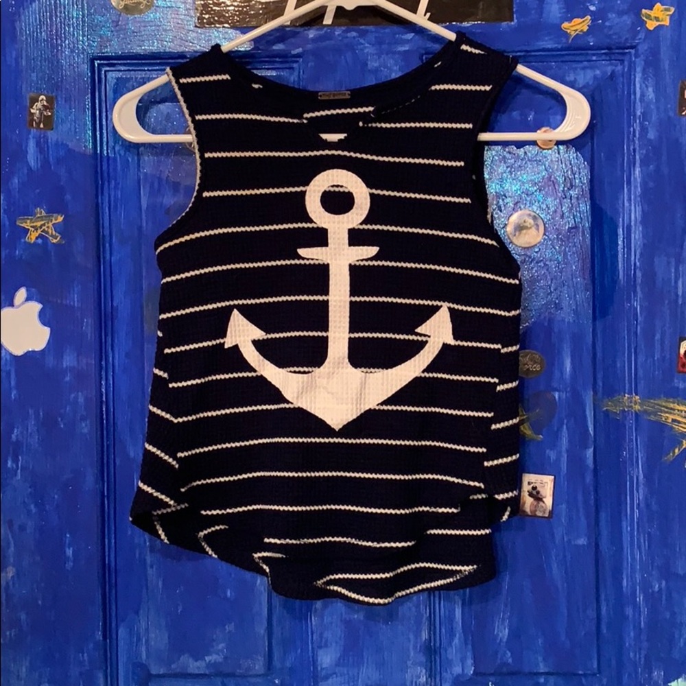 A tank top that is navy blue and white
